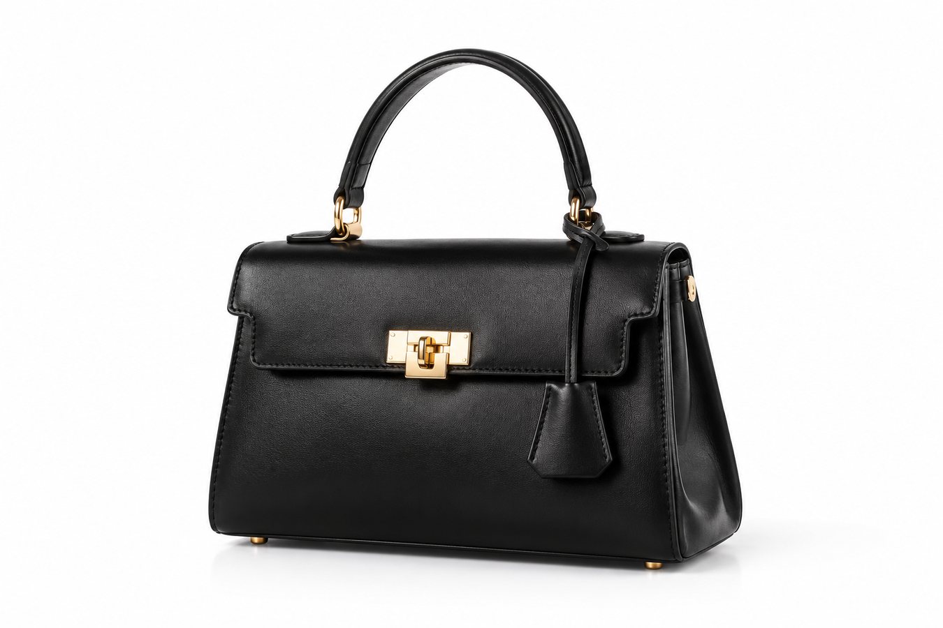 Packshot photo produit — sac à main en cuir noir sur fond blanc, studio Leizart Paris